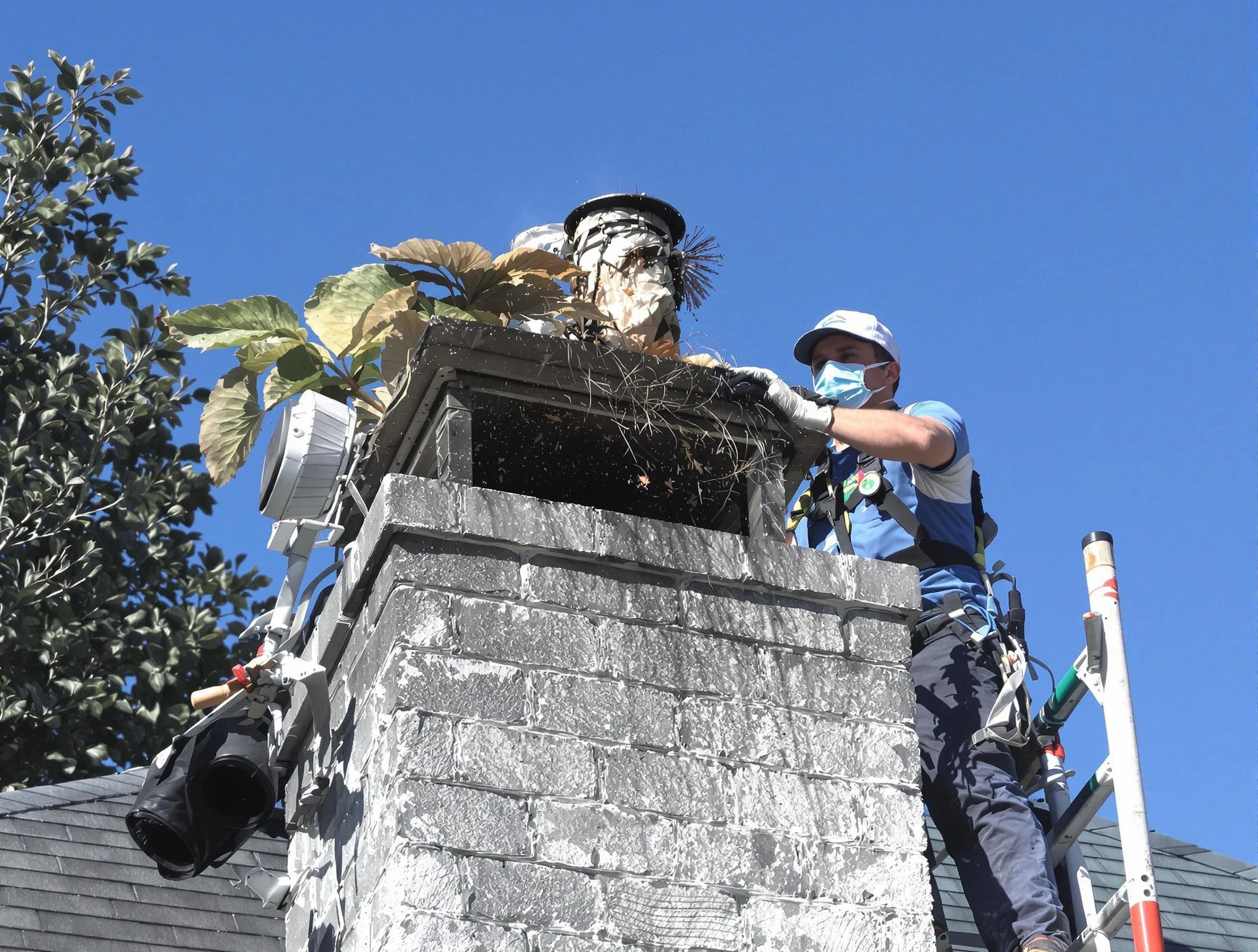 Tempe Chimney Sweep specialist performing chimney cleaning in Tempe, AZ