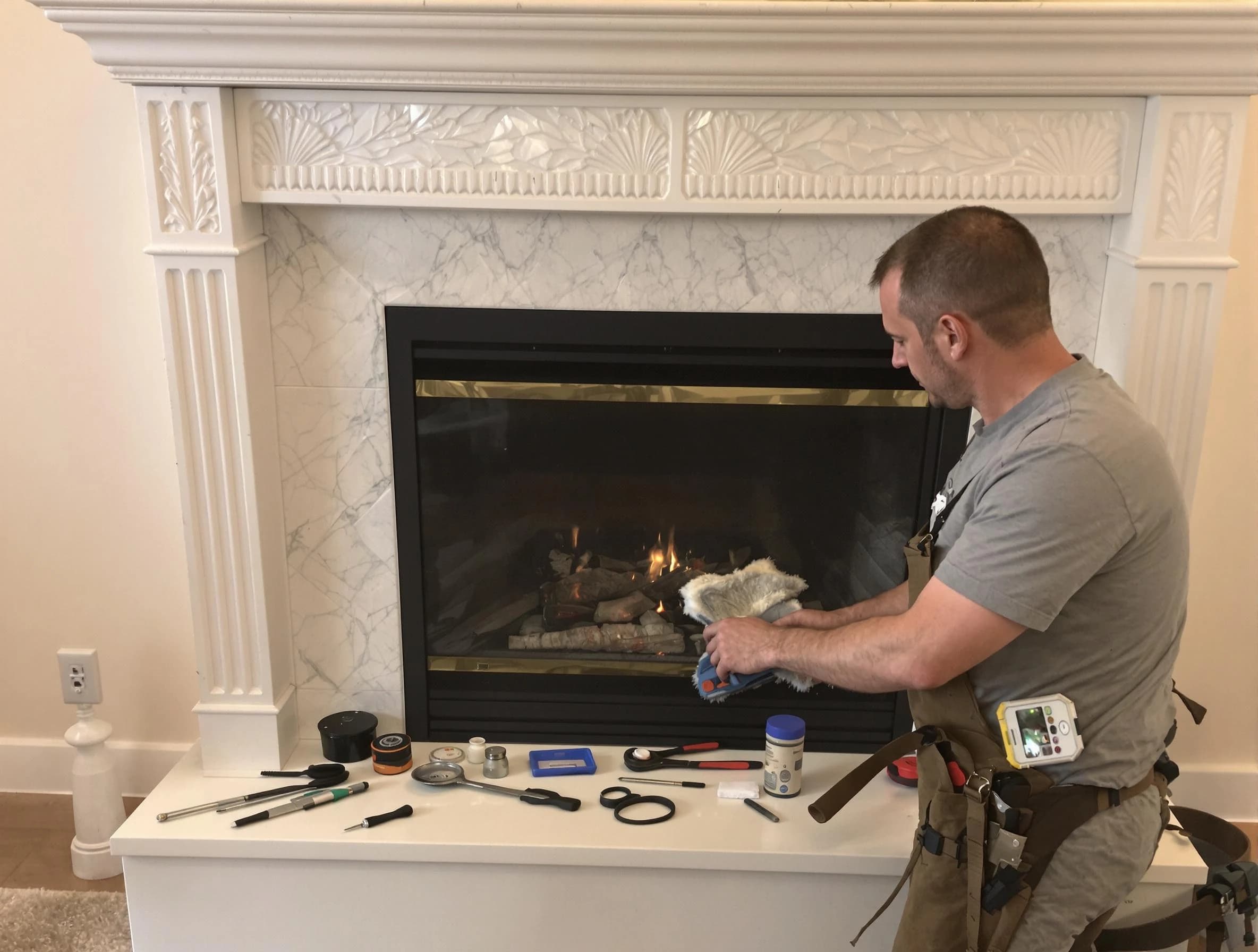 Tempe Chimney Sweep performing fireplace maintenance in Tempe, AZ
